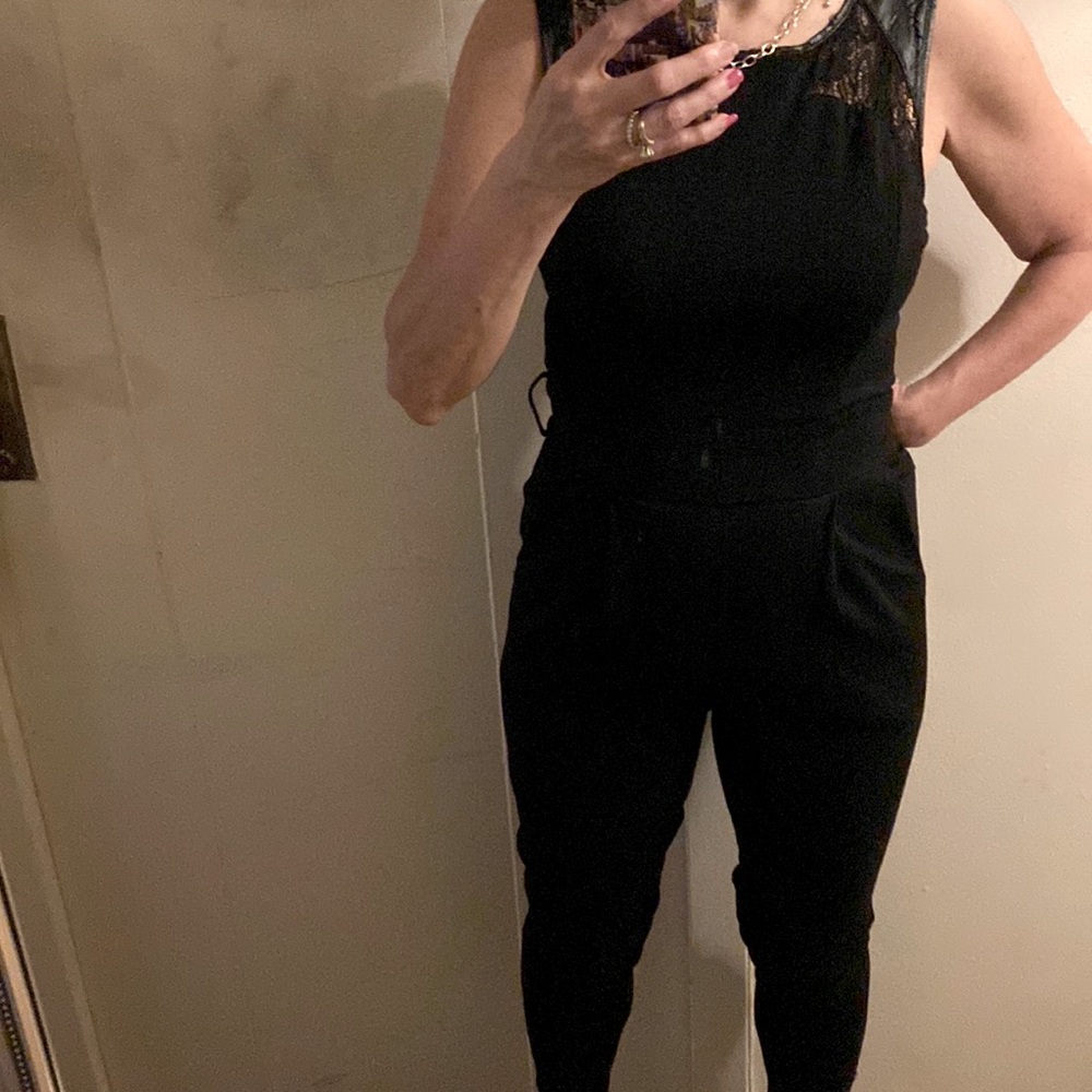 XOXO Jumpsuit with ( faux) leather and lace shoulders